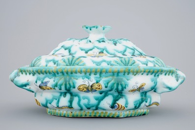 A Brussels faience tureen and cover with butterflies and caterpillars, 18th C.