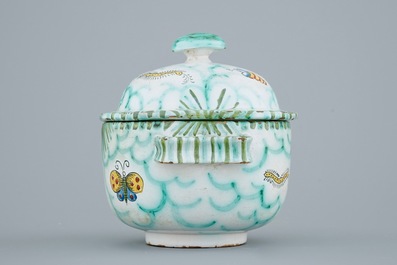 A Brussels faience tureen and cover with butterflies and caterpillars, 18/19th C.