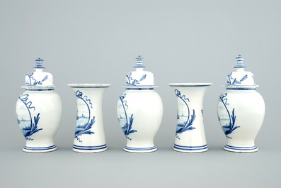 A Dutch Delft five-piece vase garniture with landscape scenes, 18th C.