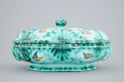 A Brussels faience tureen and cover on stand with butterflies and caterpillars, 18th C.