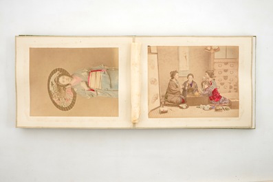 A Japanese photo album with 50 polychrome albumine photos, in original box, 19th C.