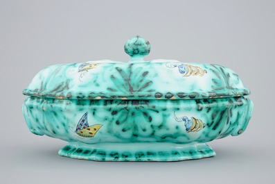 A Brussels faience tureen and cover on stand with butterflies and caterpillars, 18th C.