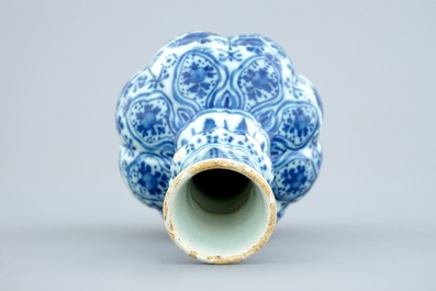 A Dutch Delft blue and white vase and a polychrome dish, 18th C.