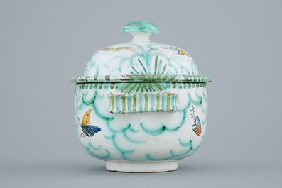 A Brussels faience tureen and cover with butterflies and caterpillars, 18/19th C.