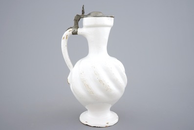 A white Dutch Delft pewter-mounted gadrooned jug, 17/18th C.