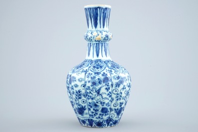 A Dutch Delft blue and white vase and a polychrome dish, 18th C.