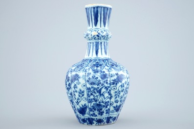 A Dutch Delft blue and white vase and a polychrome dish, 18th C.