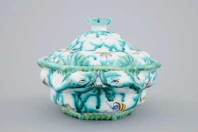 A Brussels faience tureen and cover with butterflies and caterpillars, 18th C.