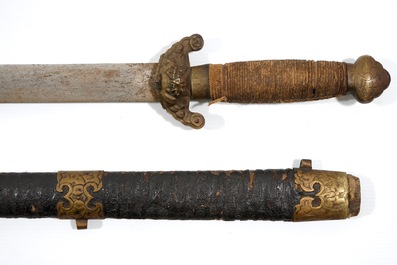 A Chinese sword in its scabbard, 19/20th C.