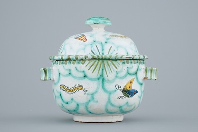 A Brussels faience tureen and cover with butterflies and caterpillars, 18/19th C.