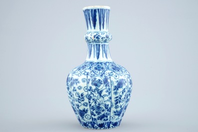 A Dutch Delft blue and white vase and a polychrome dish, 18th C.