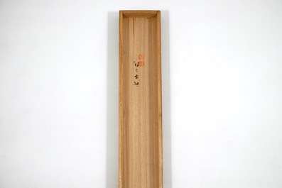 A large Japanese scroll painting in a wooden box, 19/20th C.