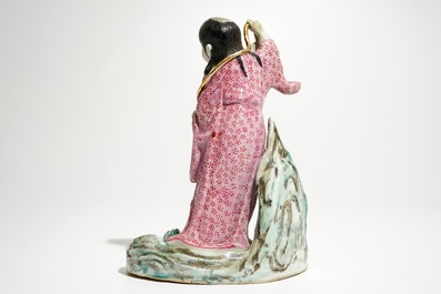 A Chinese famille rose figure of Liu Hai with the toad, 20th C.