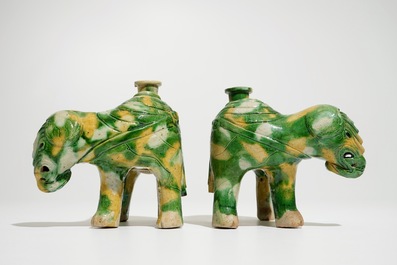 A pair of Chinese spinach and egg glazed elephant-shaped incense burners, Kangxi