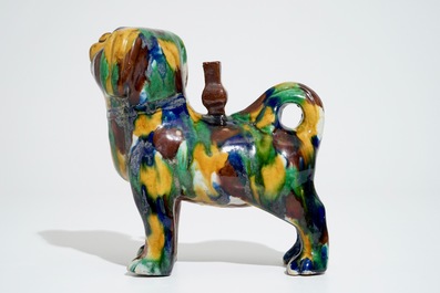 A Chinese spinach and egg glazed model of a dog on stand, 19th C.
