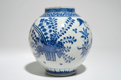 A Japanese blue and white spherical vase with birds among foliage, Edo, 17th C.