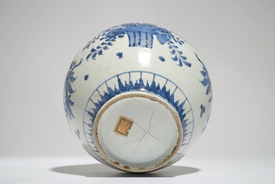 A Japanese blue and white spherical vase with birds among foliage, Edo, 17th C.