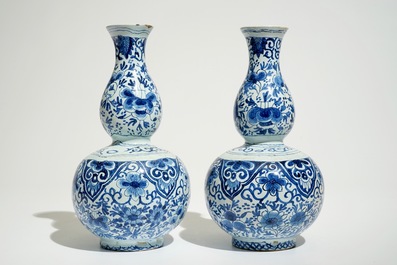 A pair of blue and white double gourd vases in Dutch Delft style, France or The Netherlands, 19th C.