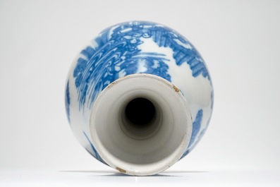 A Dutch Delft blue and white chinoiserie bottle vase, 17th C.