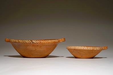 Two Werra red earthenware pottery porringers with a sun and a porcupine, dated 1607