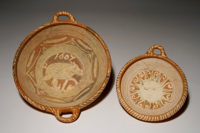 Two Werra red earthenware pottery porringers with a sun and a porcupine, dated 1607