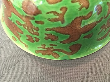A pair of Chinese green and aubergine dragon bowls, Kangxi mark and of the period