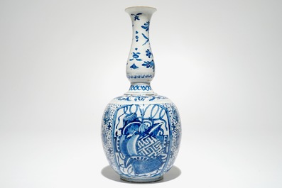 A Dutch Delft blue and white chinoiserie double gourd vase, marked, ca. 1700