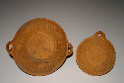 Two Werra red earthenware pottery porringers with a sun and a porcupine, dated 1607