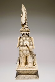 A pair of massive ivory groups of Guanyin seated on an elephants, 19th C.