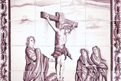 A manganese Dutch Delft 20 tile panel with Christ on the cross, late 18th C.