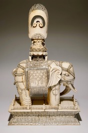 A pair of massive ivory groups of Guanyin seated on an elephants, 19th C.