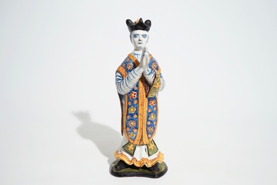 A large Dutch Delft polychrome figure of a standing priest, 18th C.