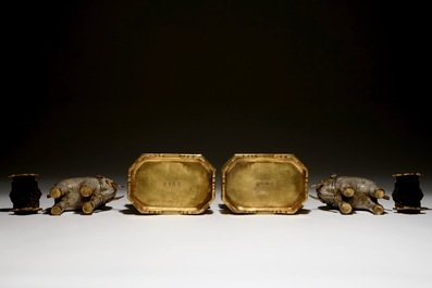 A pair of Chinese gilt bronze and cloisonne elephants on stands, 19th C.