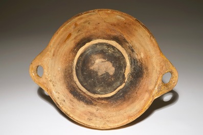 A large earthenware porringer, Northern Netherlands, early 17th C.