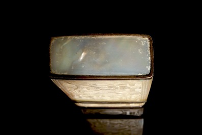 A Chinese mother of pearl cigarette box with relief design, 19th C.