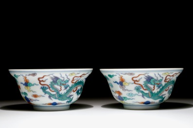 A pair of Chinese doucai &quot;dragon&quot; bowls, Yongzheng mark, 20th C.