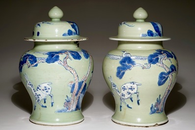 A pair of Chinese celadon, copper-red and underglaze blue vases and covers, Kangxi