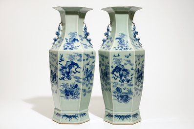 A pair of Chinese hexagonal blue and white on celadon ground vases with buddhist lions, 19th C.