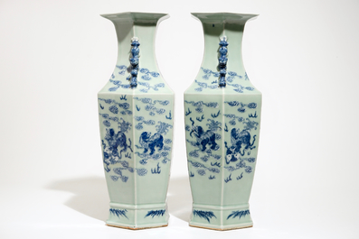 A pair of Chinese hexagonal blue and white on celadon ground vases with buddhist lions, 19th C.