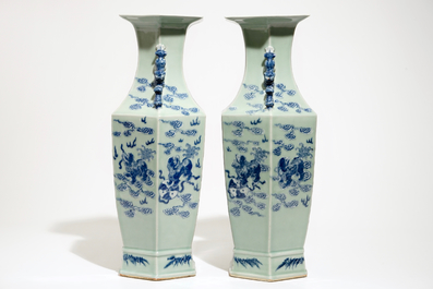 A pair of Chinese hexagonal blue and white on celadon ground vases with buddhist lions, 19th C.