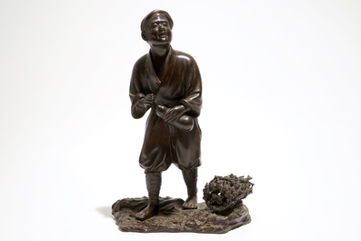 A Japanse bronze figure of a man with a double gourd, Meiji