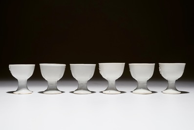 Six Chinese blanc de Chine stem cups with applied floral sprigs, 18/19th C.