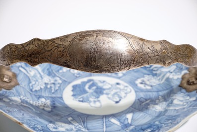 A Chinese blue and white immortal plate and a famille verte double handle cup, Kangxi