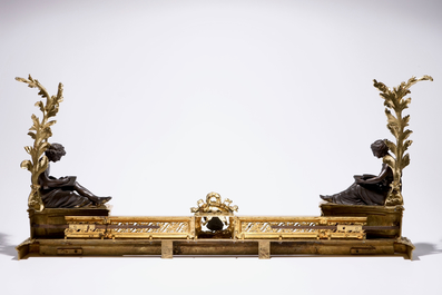 A three-piece patinated and gilt bronze adjustable fireplace fender, France, 19th C.