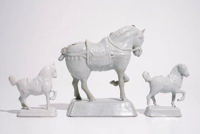 Three various white Dutch Delft horses, 18th C.