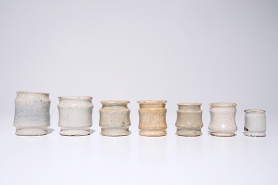 A set of seven white Dutch Delft albarello-shaped ointment jars, 17th C.
