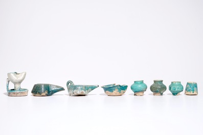 A collection of Islamic turquoise glazed oil lamps, jars and vessels, a.o. Raqqa, 13th C. and later