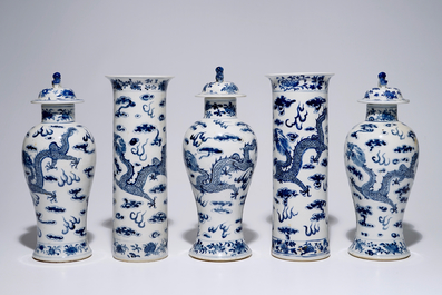 A five-piece Chinese blue and white garniture with dragons, 19th C.