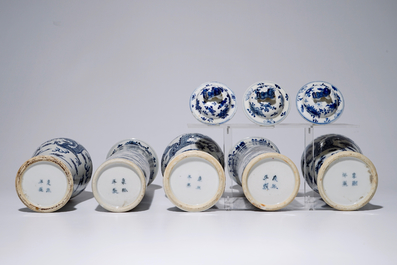 A five-piece Chinese blue and white garniture with dragons, 19th C.