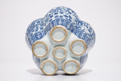 A Chinese blue and white tulipiere and a fan-shaped plaque, 19th C.